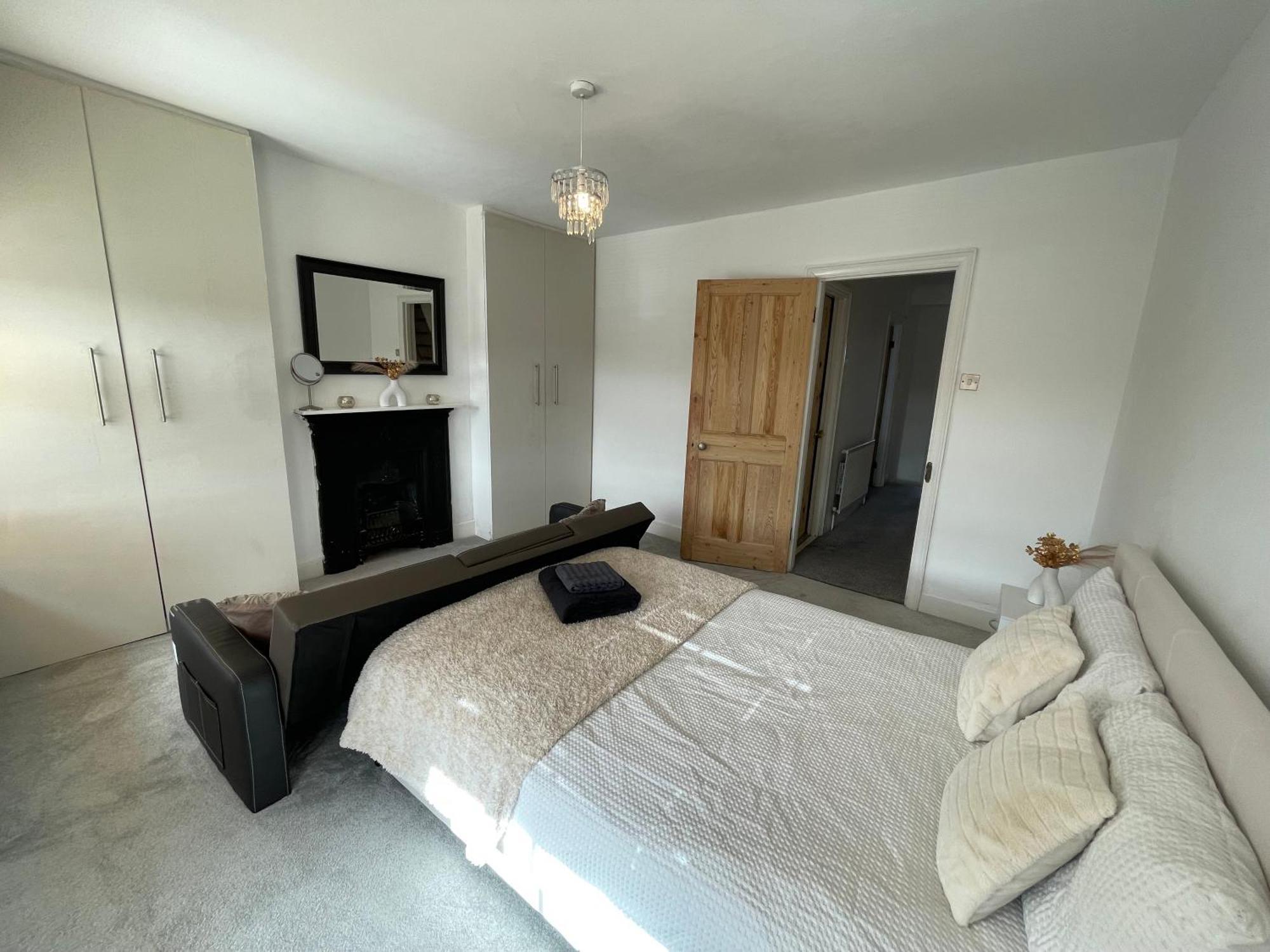 A Lovely Three Bedroom House In *