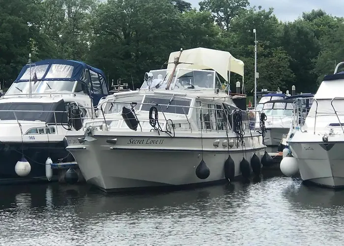 Riverside Boat Retreat On The River Thames