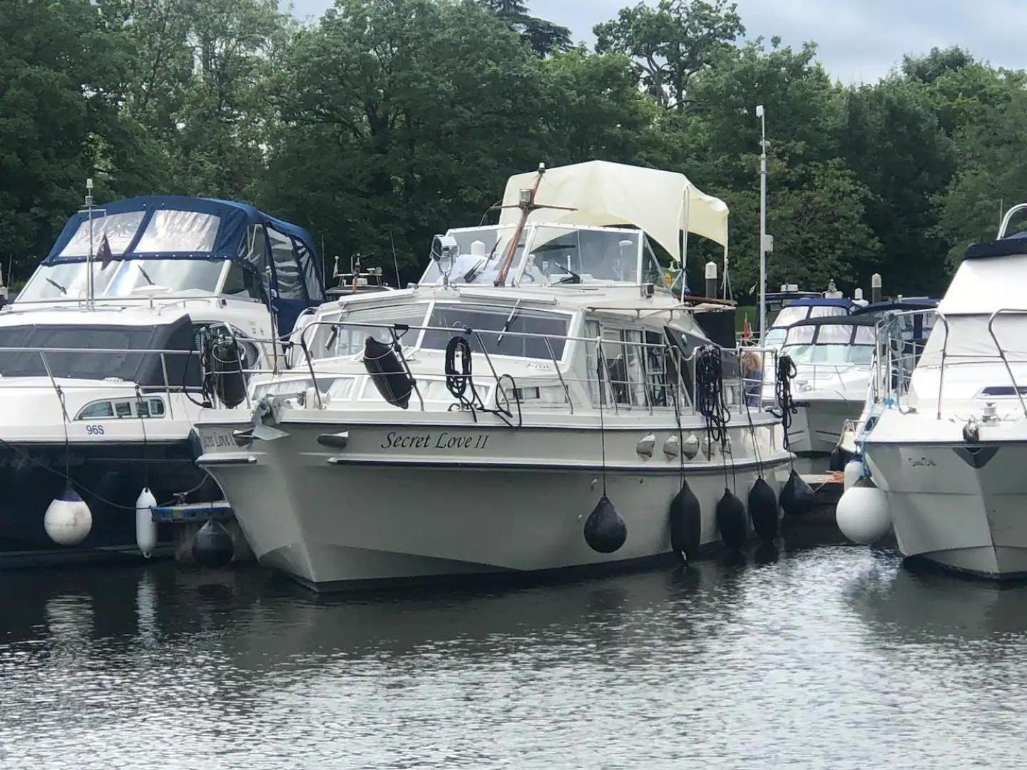 Riverside Boat Retreat On The River Thames